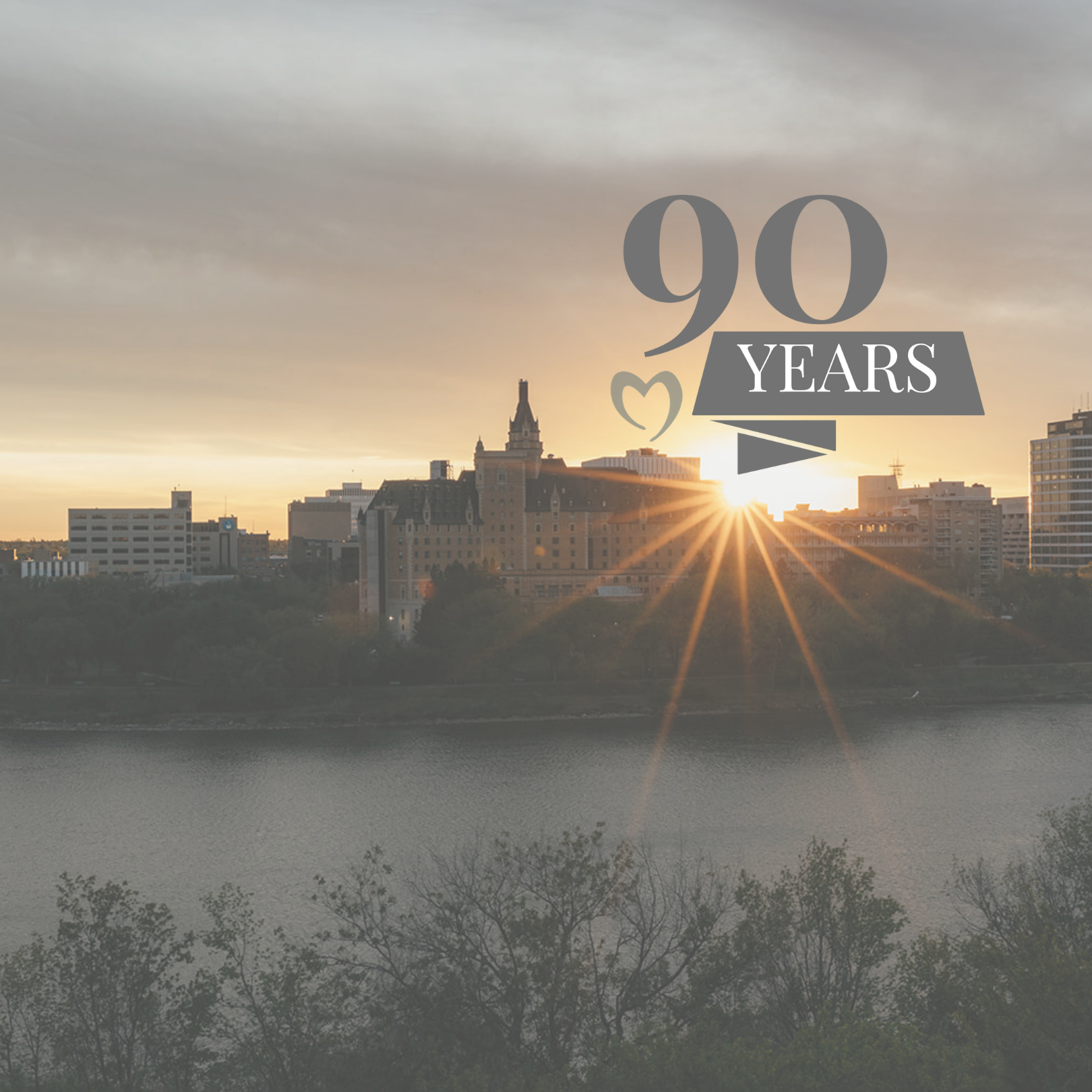 image of downtown Saskatoon with FSS 90th logo